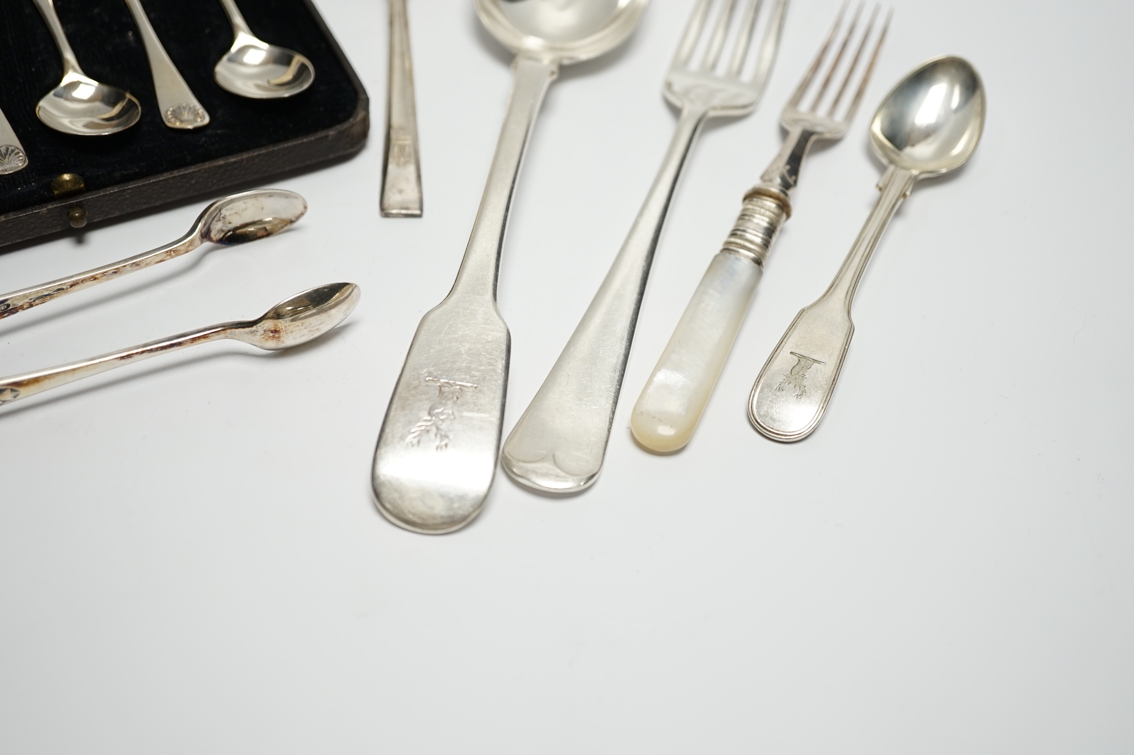 A group of assorted 19th century and late silver flatware, various patterns, dates and makers, including a set of six Hanovarian pattern dessert forks by George Adams, London, 1852(worn) and a cased set of six coffee spo